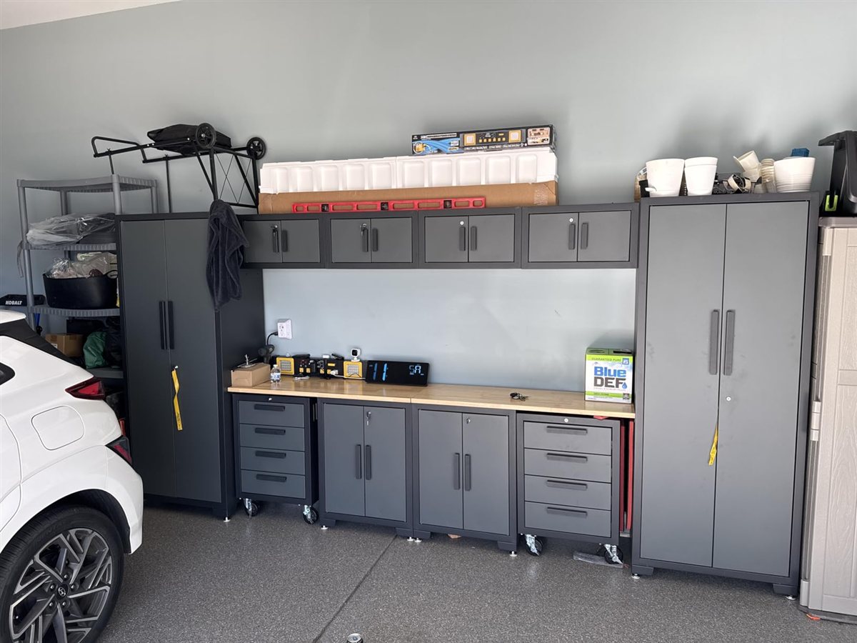 Heavy duty modular garage cabinet storage system with integrated solid worktop